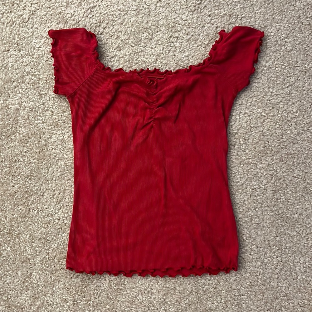 Cinched off shoulder top.